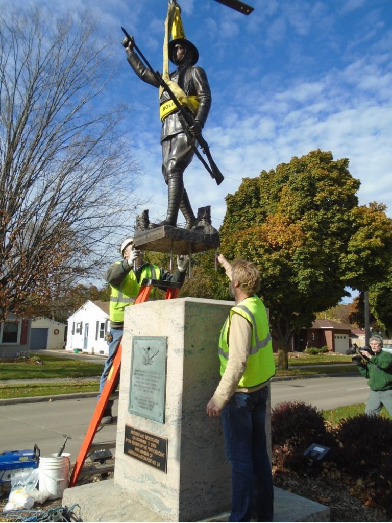 Installing the bronze doughboy in Appleton, WI 2017